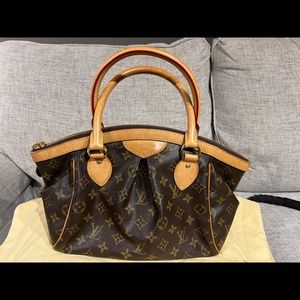 NEW LISTING. Louis Vuitton Trivoli